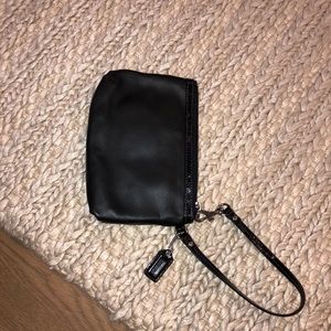 Soft leather and patent leather wristlet